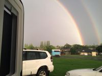 风雨过后，彩虹当空 - 美丽的彩虹周记700字